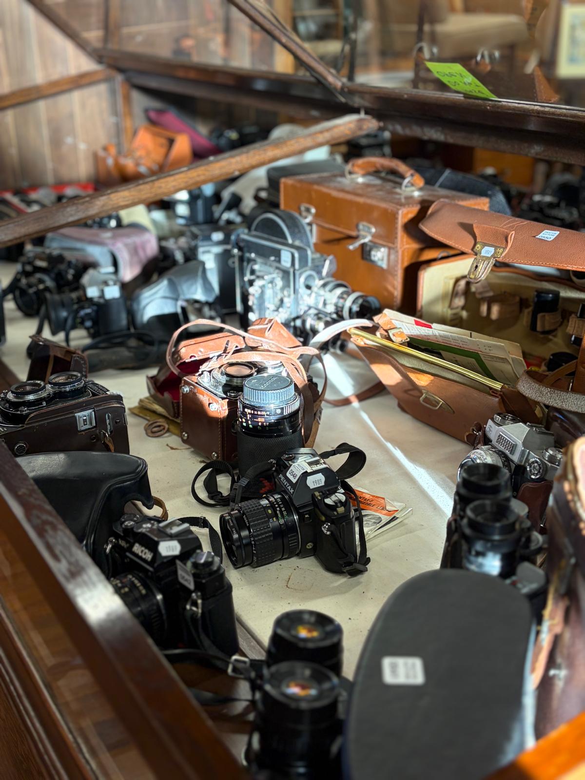 Auction 228 — Estate, Cameras & Collectibles Auction, vintage Pentax, Ricoh & Rolleiflex cameras with leather cases